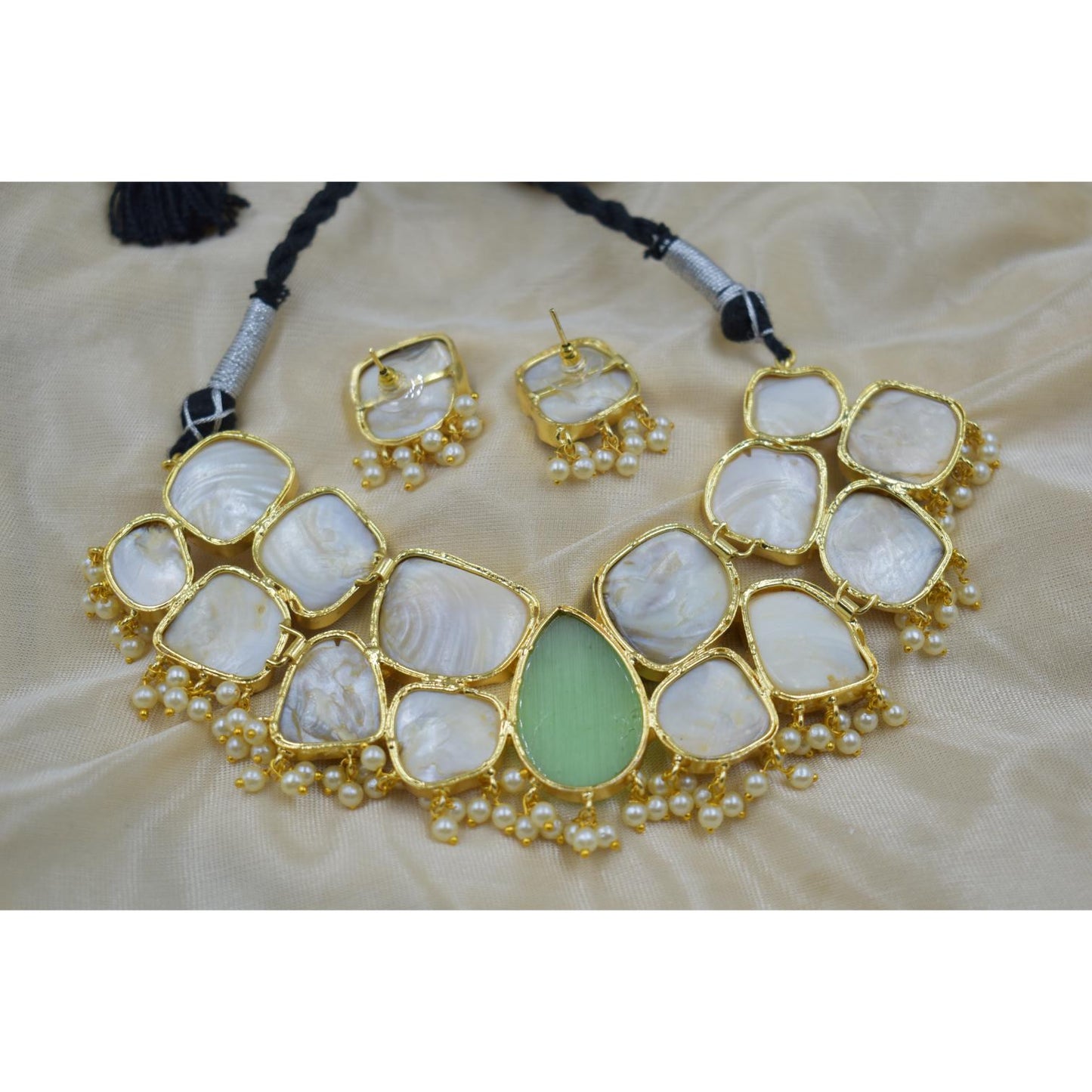 A piece of goldplated bras MOP stone Necklace