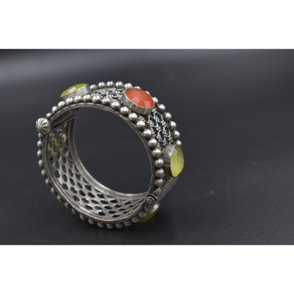 A piece of silver look alike bangle
