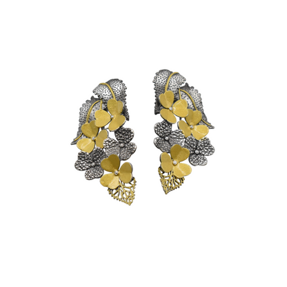 A pair of brass dual tone leaf design stud earing