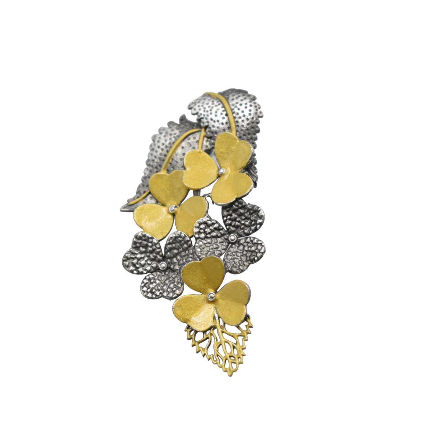 A pair of brass dual tone leaf design stud earing