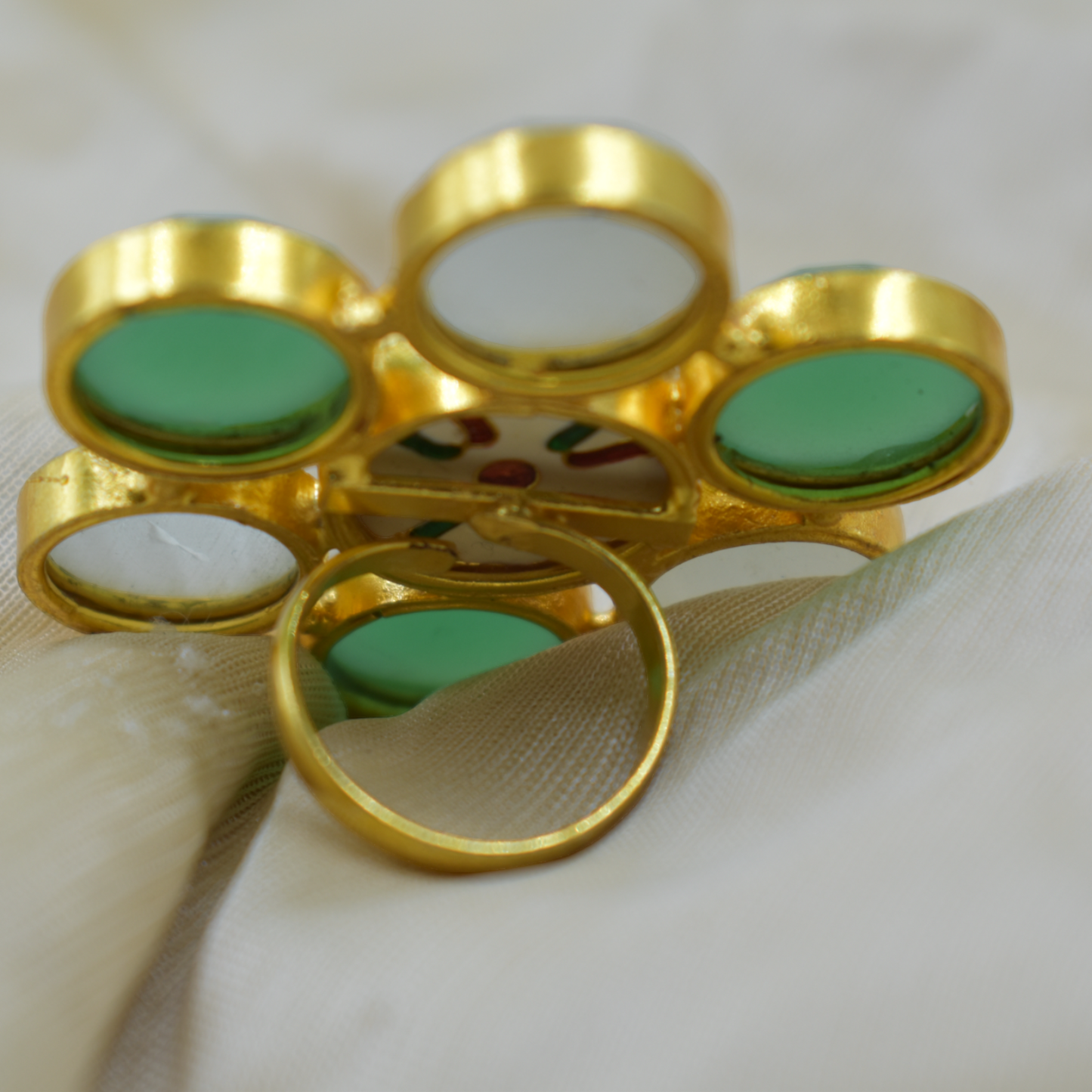 A goldplated brass stone ring