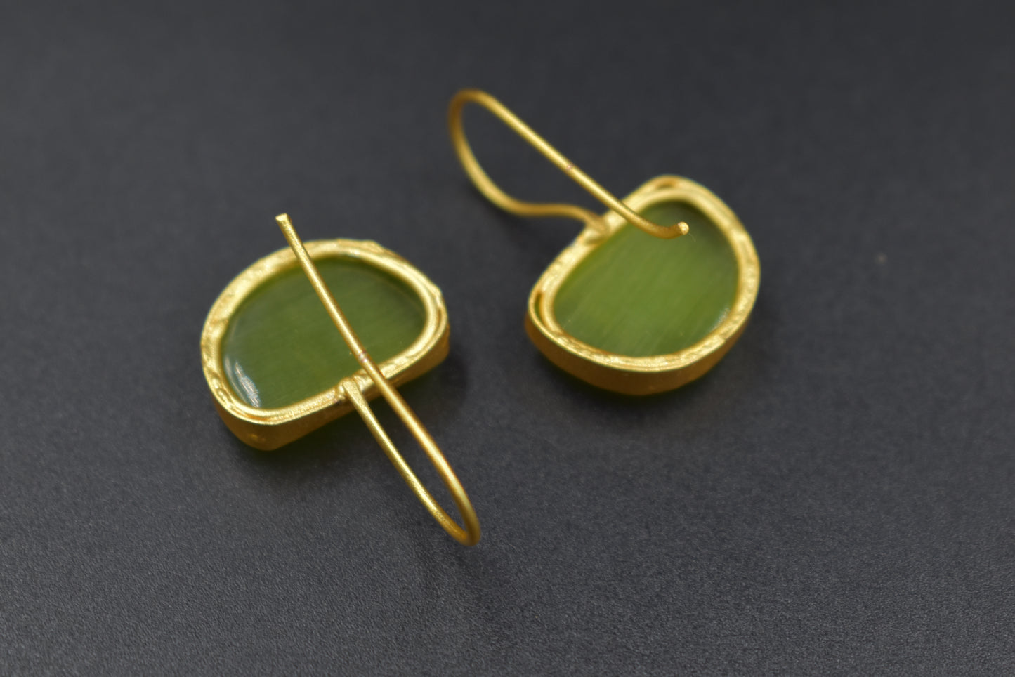 A pair of goldplated brass stone stud earing