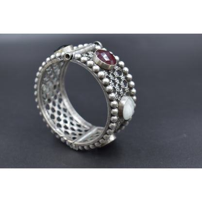 A pair of silver look alike stone bangle