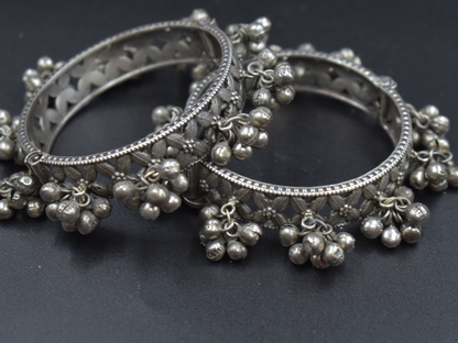 A pair of silver look alike bangle