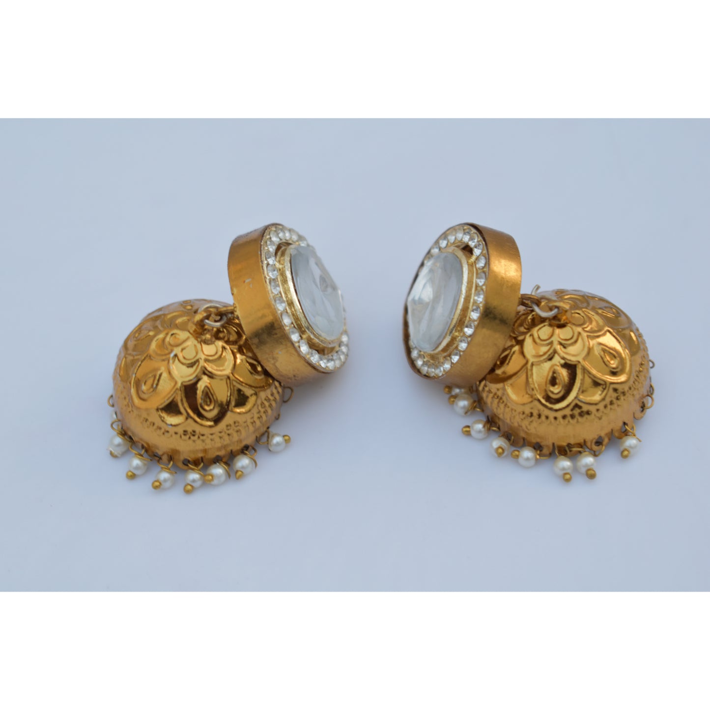 A pair of goldplated antique finish jhumka earing
