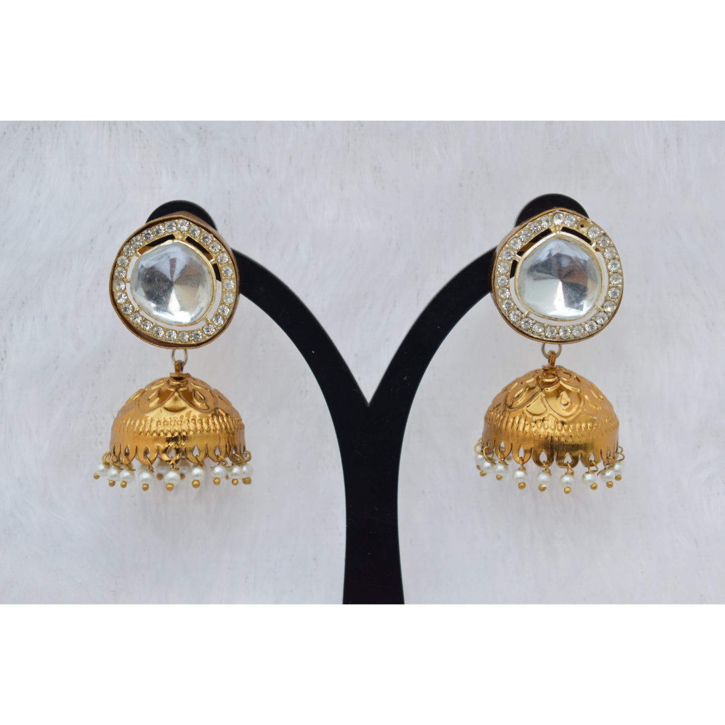 A pair of goldplated antique finish jhumka earing