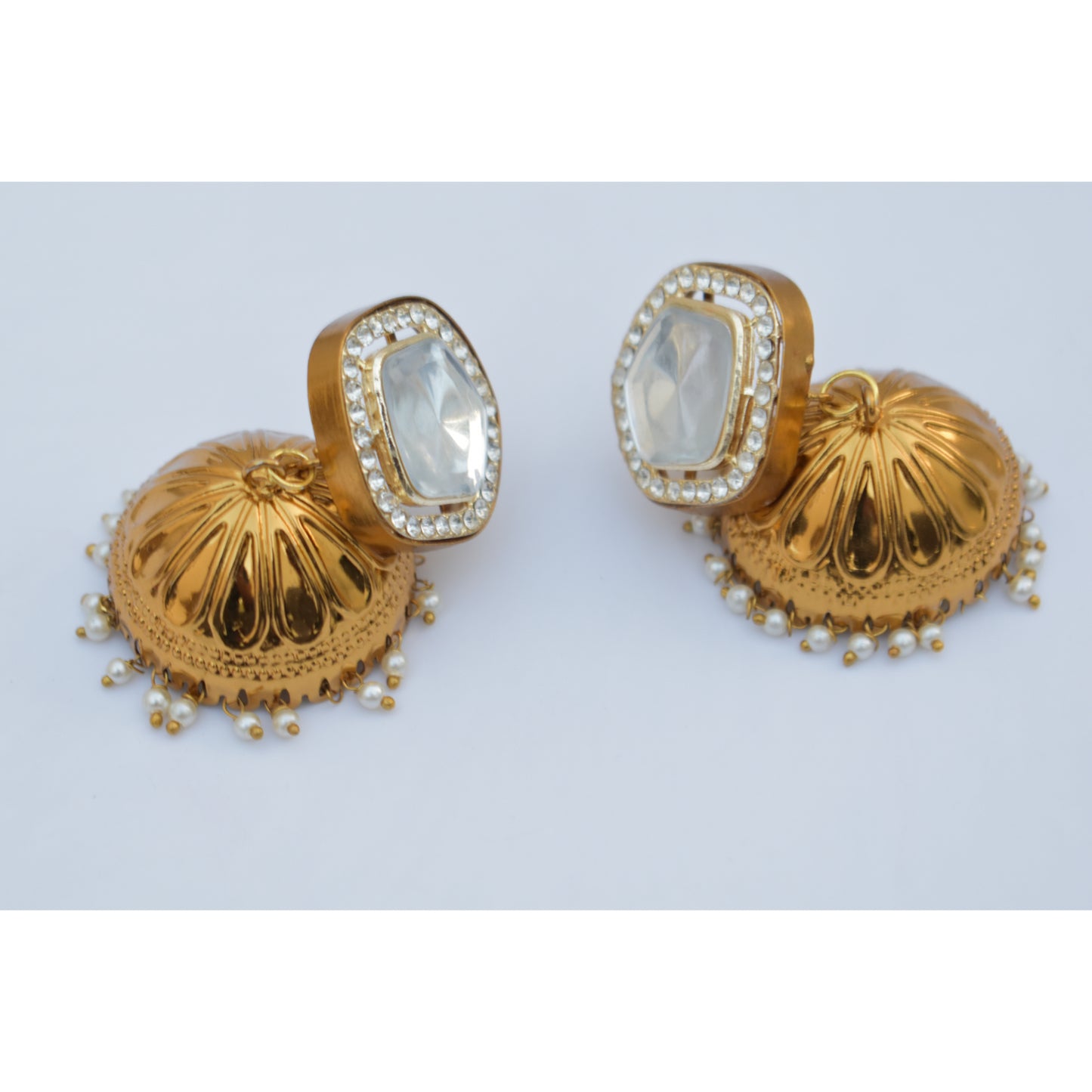 A pair of antique goldplated kundan stud jhumka earing