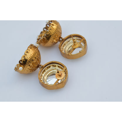 A pair of antique gold finish kundan stud jhumka earing