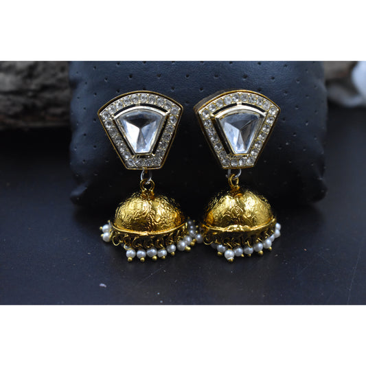 A pair of kundan stud antique gold finish jhumka earing