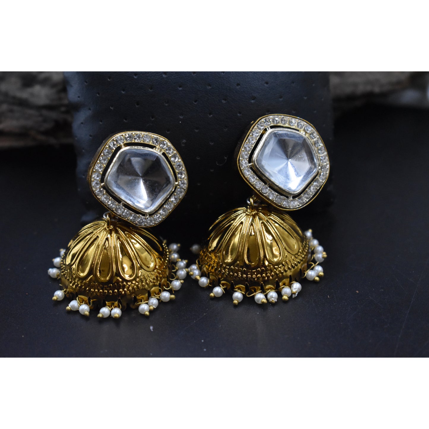 A pair of antique goldplated kundan stud jhumka earing